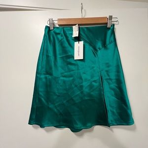 Green silk skirt with slit